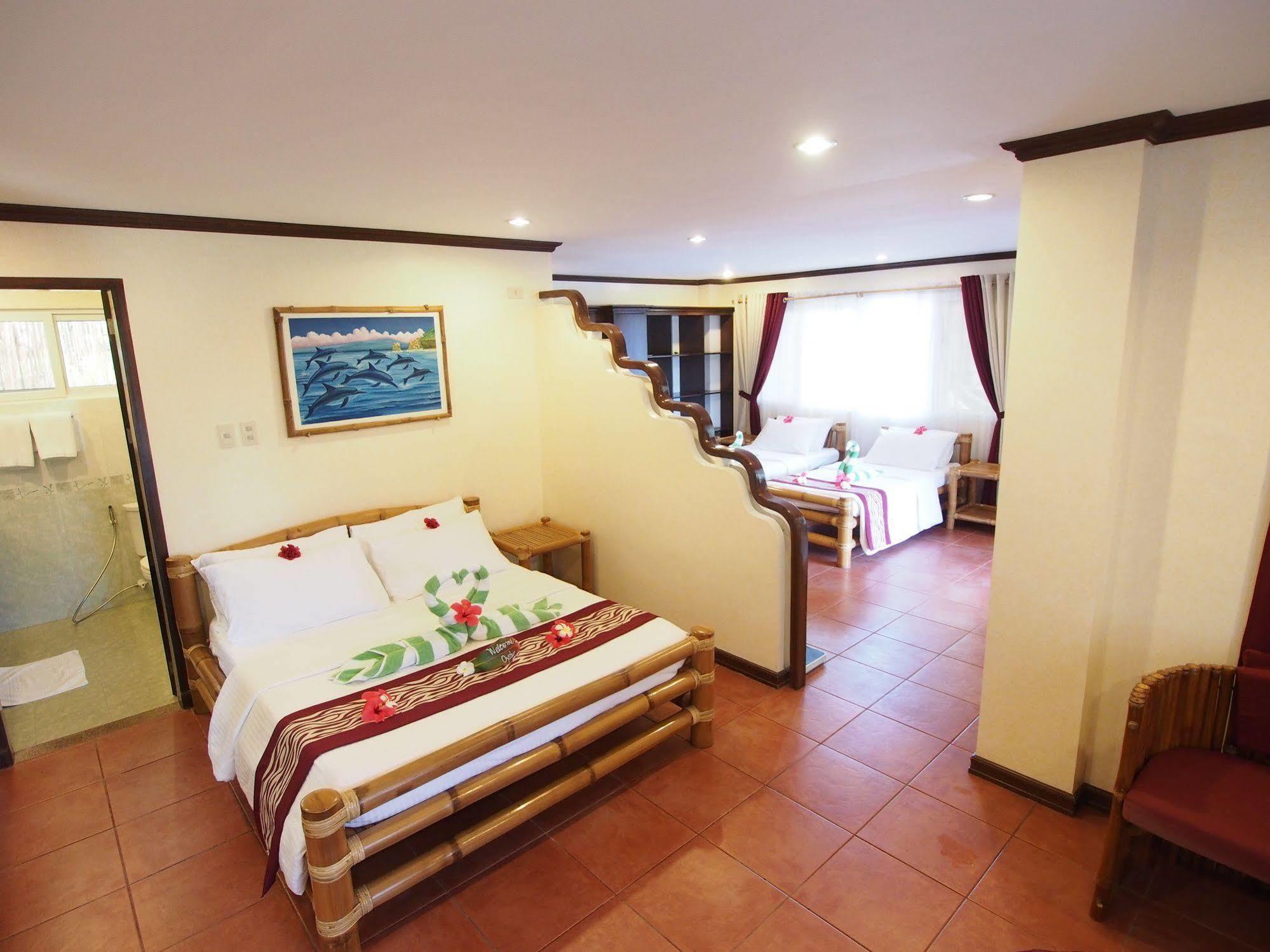 Pura Vida Beach & Dive Resort Dauin Extérieur photo