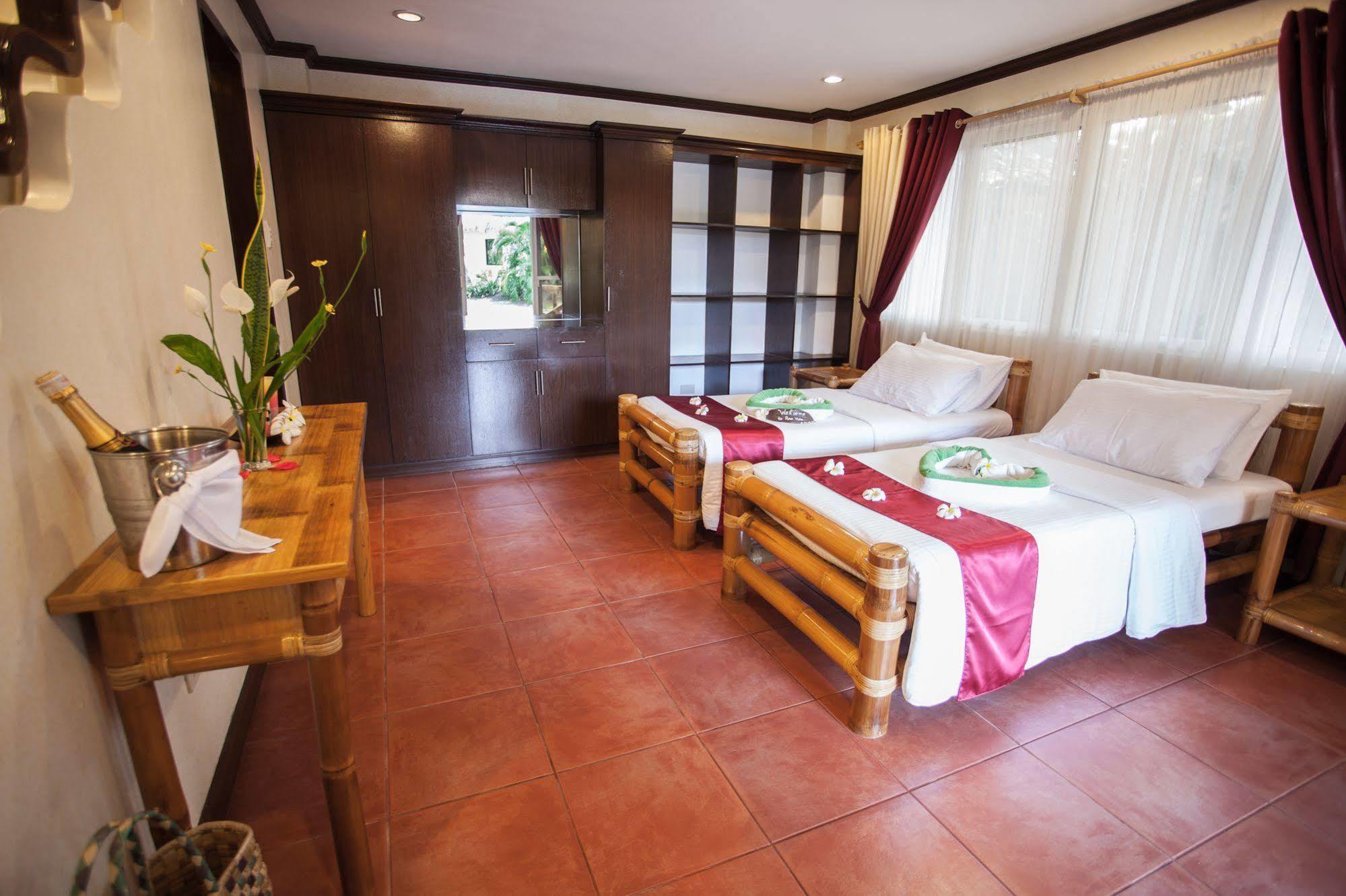 Pura Vida Beach & Dive Resort Dauin Extérieur photo