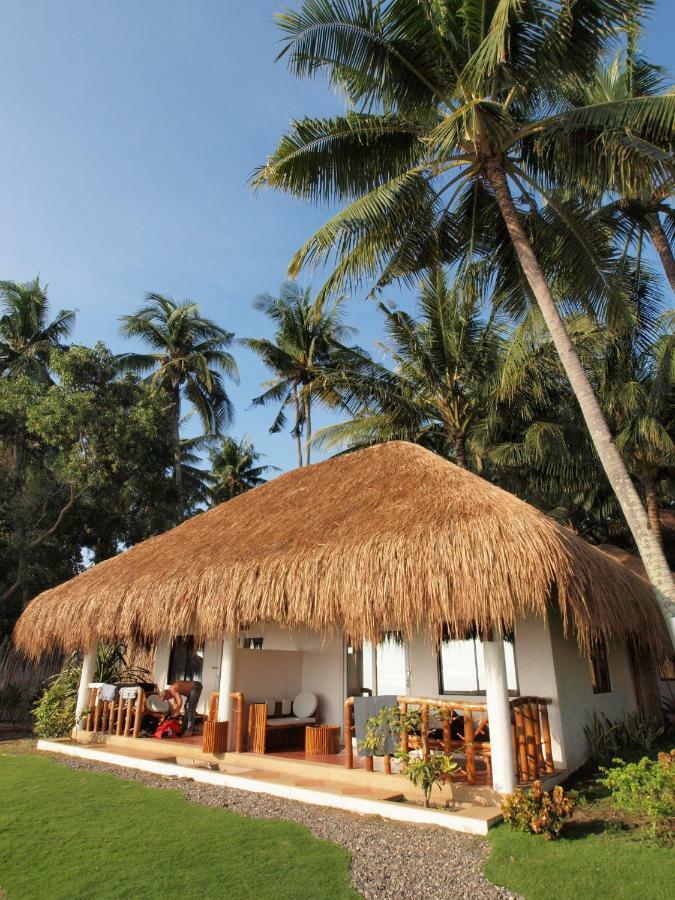 Pura Vida Beach & Dive Resort Dauin Extérieur photo