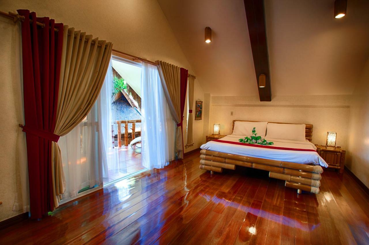 Pura Vida Beach & Dive Resort Dauin Extérieur photo